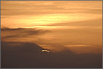 Animation du lever de soleil sortant des nuages (CANON 10D + EF 100/400 L)